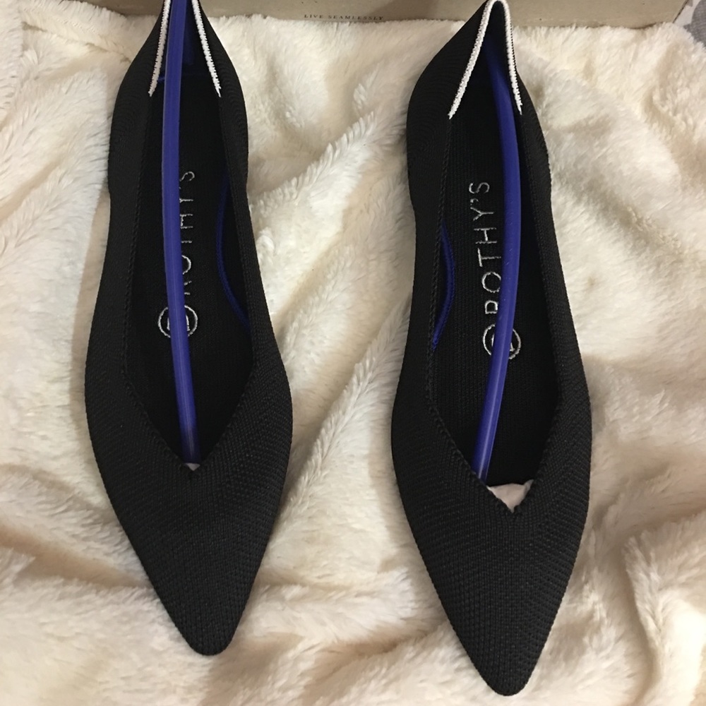 Black pointy flats